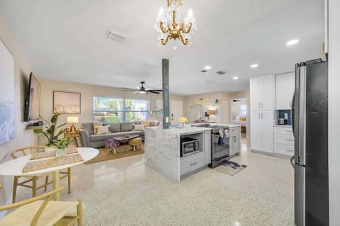 Open concept living room and kitchen area. 