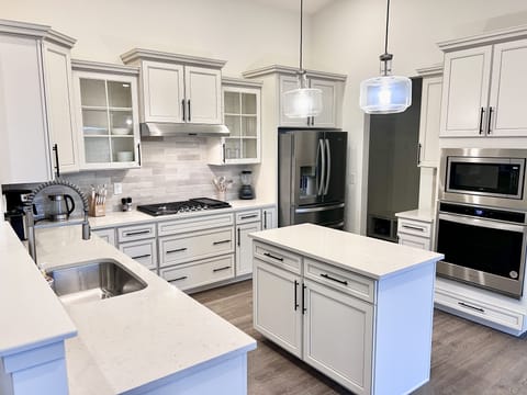 Brand new kitchen with stainless steel appliances