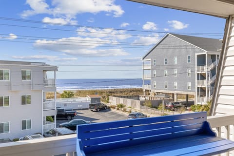 Balcony with extra seating and view of the ocean