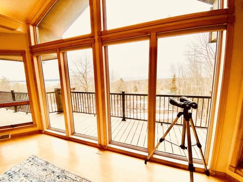 Floor to ceiling windows in living room to taken the view.