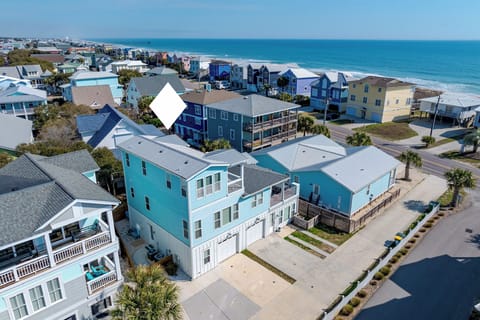 Prime Kure Beach location—ocean view, steps to the sand, and walkable to pier