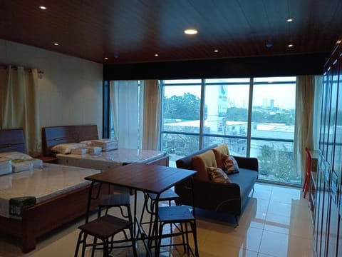 Deluxe Suite, City View | Desk, laptop workspace, WiFi (free), individually decorated