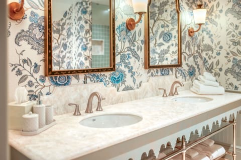 Top Left:<br>Revel in vintage elegance where bold florals and warm lighting turn daily rituals into indulgent escapes.