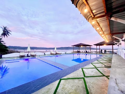 Outdoor pool, pool umbrellas, sun loungers
