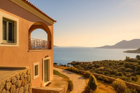Panoramic Terrace Views
Watch the sun set over olive groves and hills from this elevated perch.