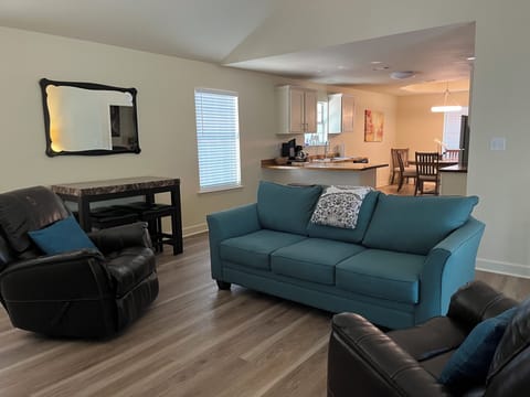 Den with additional seating & sleeper sofa for more conversation and relaxation