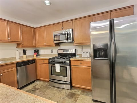 Full kitchen stocked for cooking and entertaining.