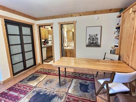 Living Area with View to Bathroom and Kitchen, Spacious Storage Closet