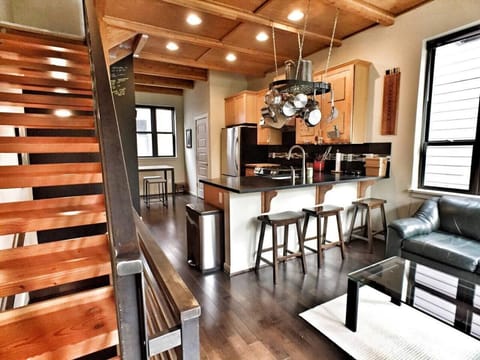 Well-stocked kitchen with stainless steel appliances, gas stove, and all the basics - including the owner's special stash of spices! The open kitchen lets the cook be part of all the action. 