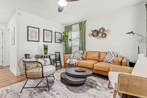 Relax at our modern style living room which is the perfect retreat after a day of exploring the city and activities.