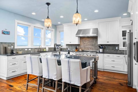 "Loved the spacious kitchen and the decks and the many family rooms! We will be back!" - Annette