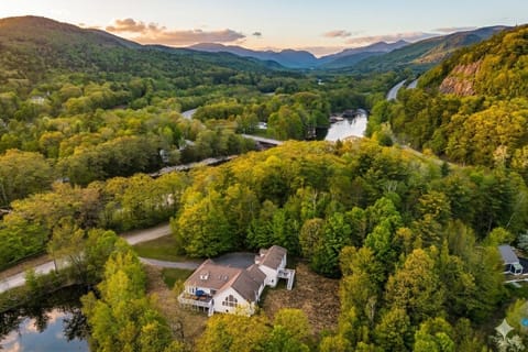 A private dirt road leads to the 10 acre property with private river frontage