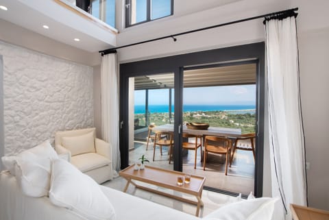 Executive Duplex | Living area | 43-inch flat-screen TV with digital channels