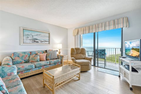 Cozy living room with ocean views and plenty of natural light!