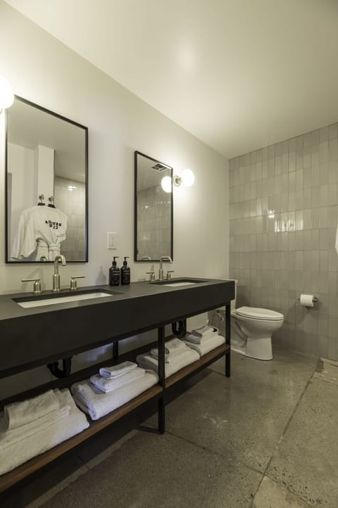 Shower, designer toiletries, hair dryer, bathrobes