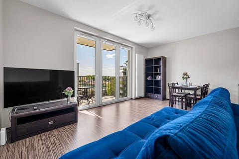 Comfortable Living Room with Sofa Bed and Smart TV | Book Now with RENTUJEMY
