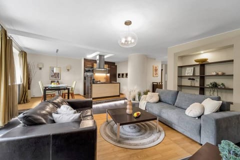 Comfortable Living Room with Sofa Bed and Smart TV | Book Now with RENTUJEMY