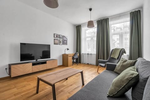 Main Living Area with a Smart TV | Book Now with RENTUJEMY.COM