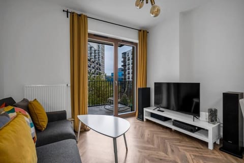 Comfortable Living Room With Sofa Bed and Smart TV | Book Now With RENTUJEMY