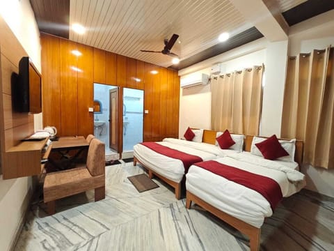 Family Triple Bed AC Room Double Bathroom | Blackout drapes, free WiFi, bed sheets