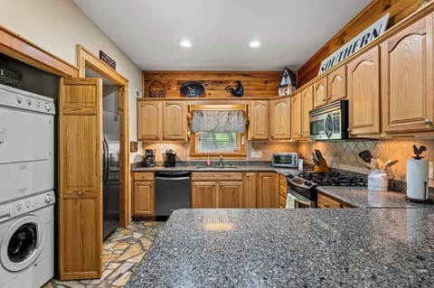 Tons of counter space, stainless steel appliances, washer/dryer.