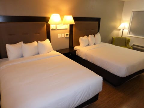Premium bedding, memory foam beds, desk, blackout drapes