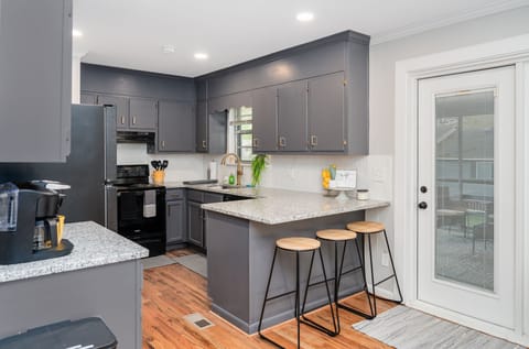 Kitchen with covered porch off the back