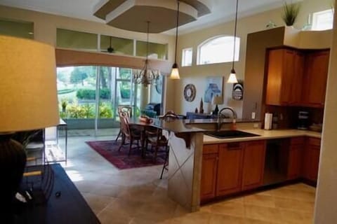 Hallway opens to kitchen.