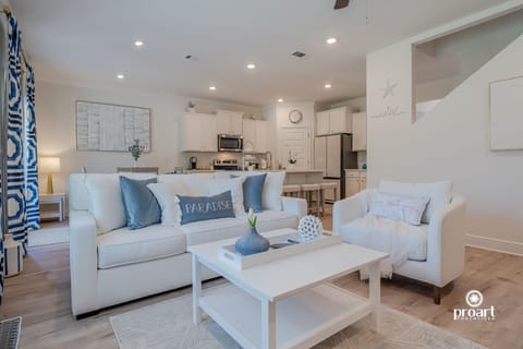 The living room is the perfect sanctuary for relaxing after a day at the beach.