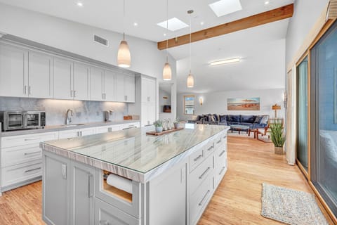 Fully stocked kitchen (upstairs) with access to the balcony