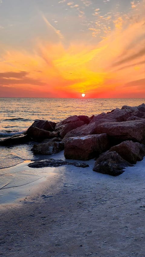 Steps to amazing sunsets on St. Pete Beach or use the heated pool