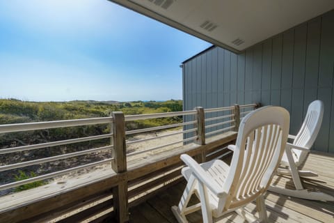 Primary suite deck with outdoor seating