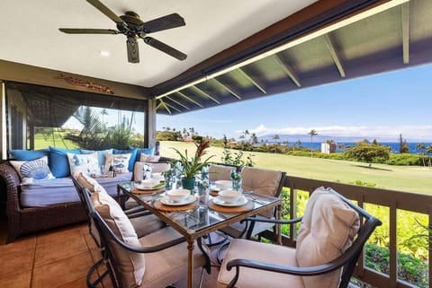 Enjoy alfresco dining with breathtaking ocean views and lush greenery right from your private lanai