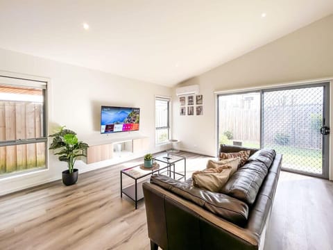 spacious living room for family gathering and entertaining