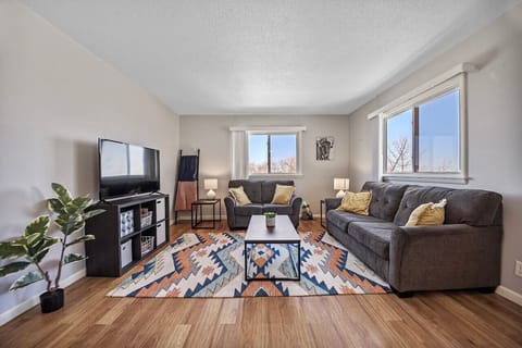 A cozy and inviting living room adorned with plush furnishings perfect for relaxation and gatherings with loved ones.
