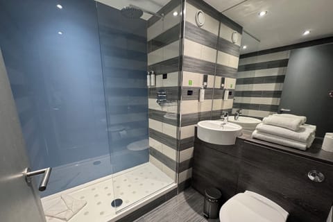 Shower, rainfall showerhead, eco-friendly toiletries, hair dryer