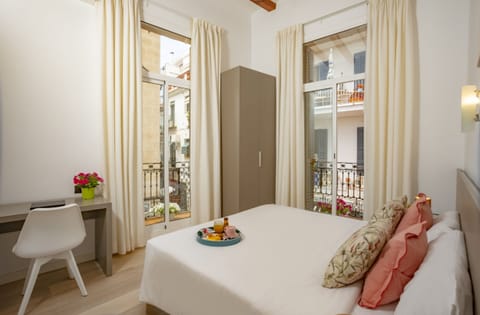 Double Room, Balcony, City View | Desk, laptop workspace, free WiFi, bed sheets