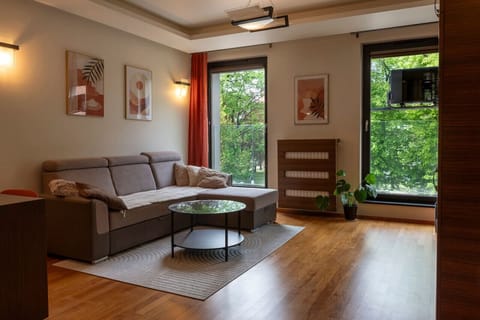 Comfortable Living Room with Sofa Bed and Smart TV | Book Now with RENTUJEMY
