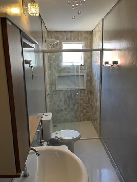 Shower, towels, soap, toilet paper