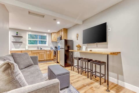 Open-concept layout with seamless flow from living room to kitchen—perfect for entertaining, family stays, and relaxing in comfort during your getaway.