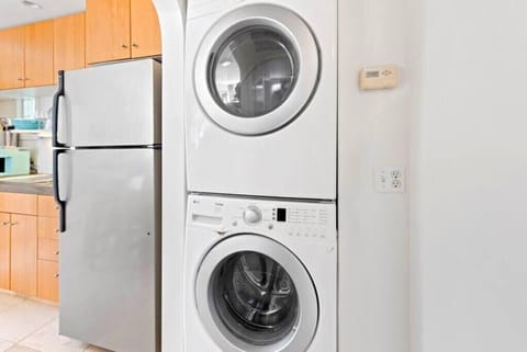 Washer and dryer in unit, laundry detergent provided.