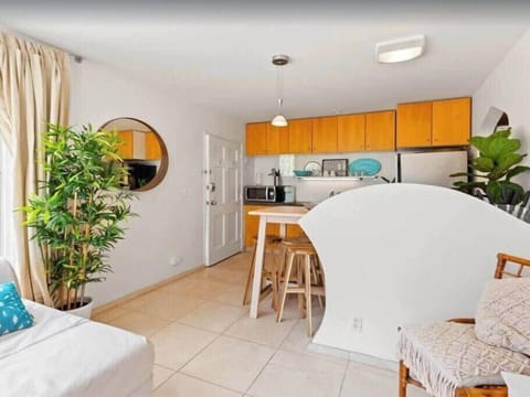 Kitchen is located right as you enter the home.  It has all kitchen essentials needed for a comfortable stay. 
Keurig Coffee machine and coffee provided. 