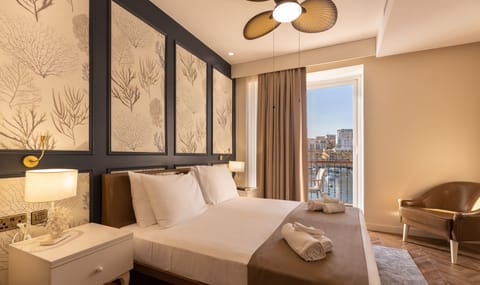 Deluxe Family Room, Balcony, Sea View | In-room safe, desk, laptop workspace, soundproofing