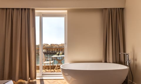 Superior Family Room, Balcony, Sea View | Deep soaking bathtub