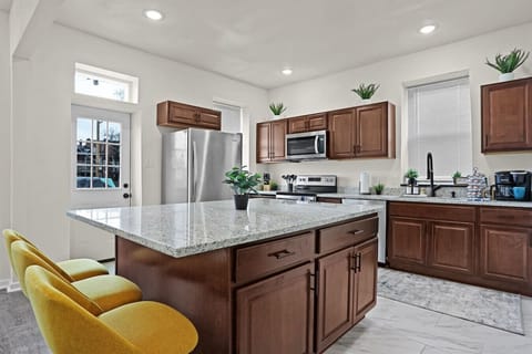 A chef`s delight, this fully equipped kitchen is ready for culinary adventures.