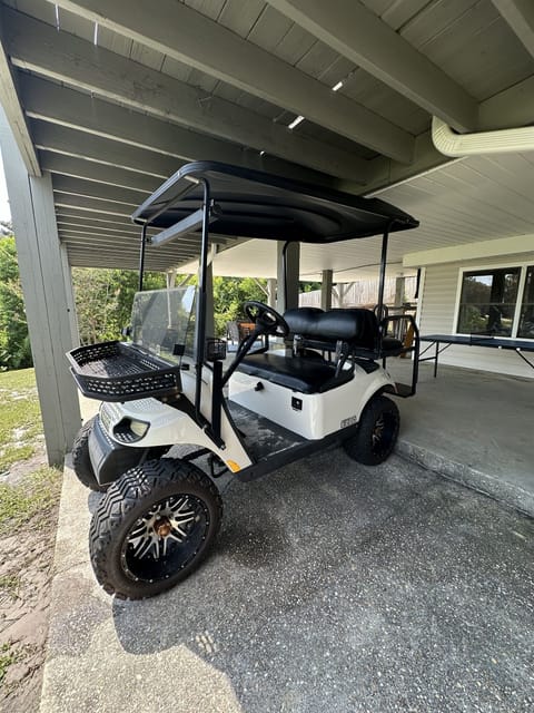 A golf cart is provided for your beach trips! 