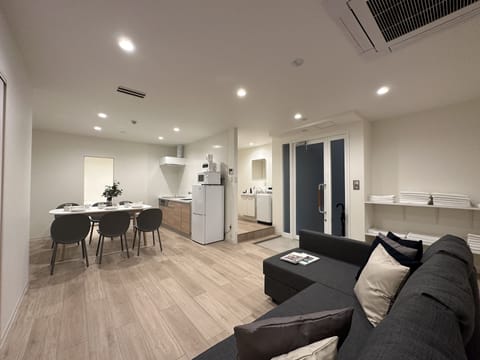 Premium Apartment | Living area | 43-inch Smart TV with cable channels