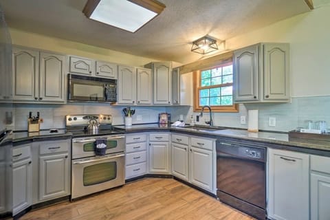 Enjoy your favorite dishes in our modern kitchen equipped with up-to-date appliances, ample counter space, and a welcoming space.