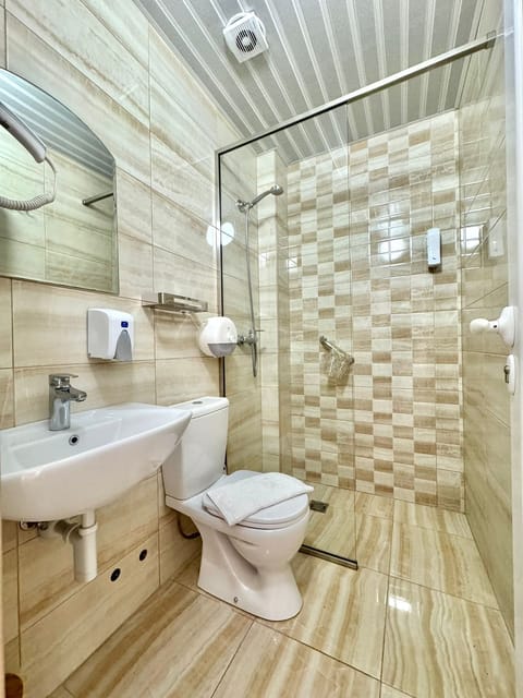 Classic Double or Twin Room | Bathroom | Shower, hair dryer, towels, toilet paper