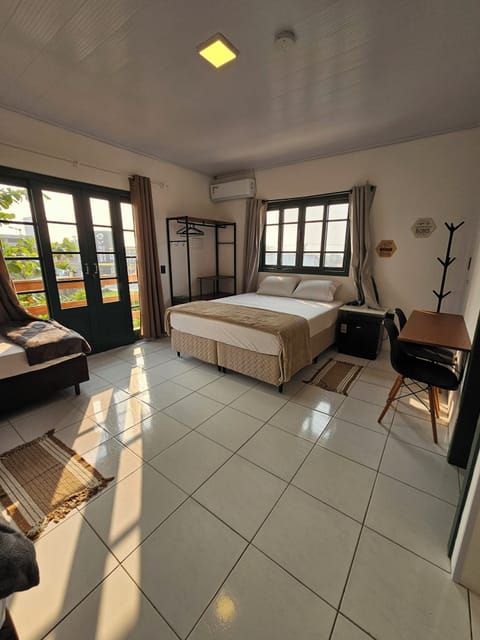 Family Quadruple Room, Sea View | Memory foam beds, laptop workspace, blackout drapes, free WiFi